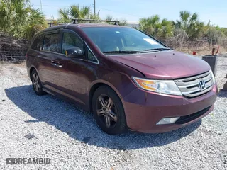 2013 Honda Odyssey Touring with VIN 5FNRL5H96DB037947, listed as a IAAI auction lot 41813910 with 231,920 mi miles. Bid and sale history available at carsss.com. Image 1.
