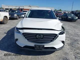 2019 Mazda CX-9 Touring z VIN JM3TCACY3K0333931, wystawiony jako IAAI lot #41968519 z przebiegiem 102 992 mil mil oraz . Historia ofert i sprzedaży dostępna na DreamBid. Obrazek 12.