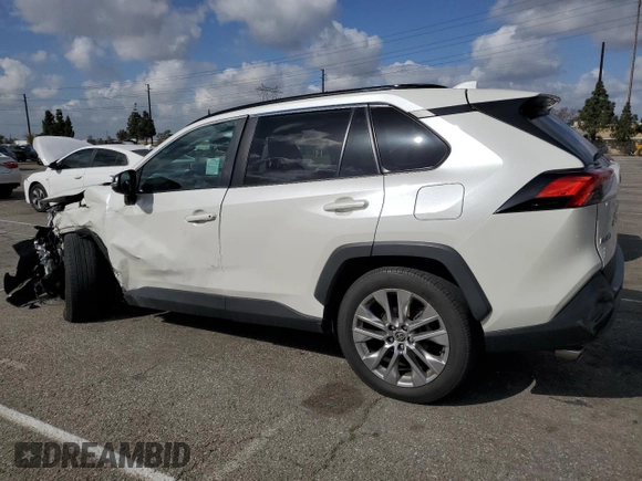 2021 Toyota RAV4 XLE Premium with VIN 2T3C1RFV1MW180625, listed as a Copart auction lot 51799175 with 63,692 mi miles and Salvage title. Bid and sale history available at DreamBid. Image 2.