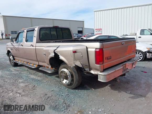 1997 Ford F-350 z VIN 1FTJW35G7VEC80262, wystawiony jako IAAI lot #38286107 z przebiegiem 158 206 mil mil oraz . Historia ofert i sprzedaży dostępna na DreamBid. Obrazek 3.