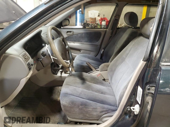 1999 Toyota Corolla VE with VIN 2T1BR12E2XC136739, listed as a Copart auction lot 60693625 with 170,989 mi miles and Salvage title. Bid and sale history available at DreamBid. Image 7.