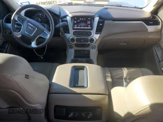 2015 GMC Yukon XL SLT with VIN 1GKS1HKC6FR166415, listed as a Copart auction lot 73029014 with 105,209 mi miles and Salvage Title. Bid and sale history available at carsss.com. Image 8.