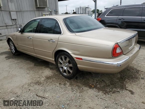 2004 Jaguar XJ with VIN SAJEA74C84SG03857, listed as a Copart auction lot 62156875 with 92,649 mi miles and Salvage title. Bid and sale history available at DreamBid. Image 2.