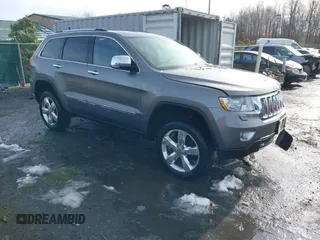 2013 Jeep Grand Cherokee Overland with VIN 1C4RJFCG8DC581719, listed as a IAAI auction lot 41566666 with 152,332 mi miles. Bid and sale history available at carsss.com. Image 1.