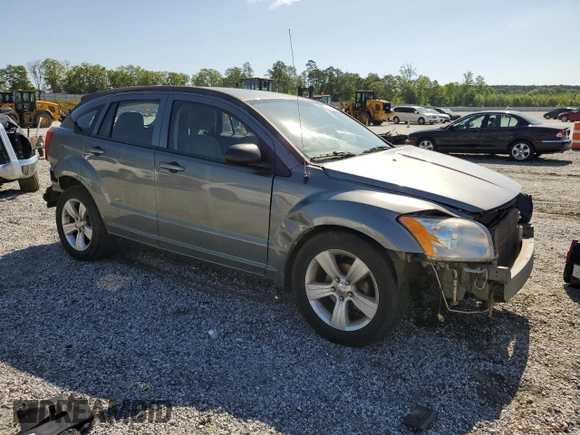 2011 Dodge Caliber Mainstreet z VIN 1B3CB3HA1BD268803, wystawiony jako Copart lot #54800865 z przebiegiem 180 293 mil mil oraz Szkoda całkowita • Salvage title. Historia ofert i sprzedaży dostępna na DreamBid. Obrazek 4.