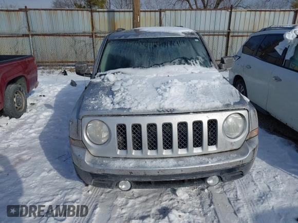 2011 Jeep Patriot Latitude with VIN 1J4NT1GBXBD289758, listed as a IAAI auction lot 41301702 with 215,068 mi miles. Bid and sale history available at carsss.com. Image 6.