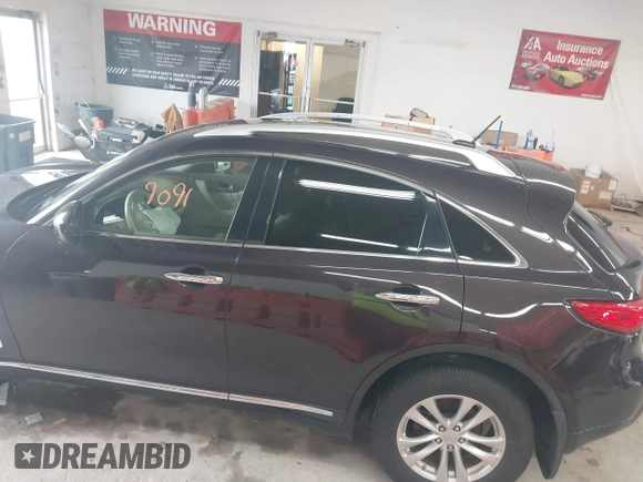 2016 Infiniti QX70 z VIN JN8CS1MW6GM752420, wystawiony jako IAAI lot #42509091 z przebiegiem 55 196 mil mil oraz . Historia ofert i sprzedaży dostępna na DreamBid. Obrazek 14.