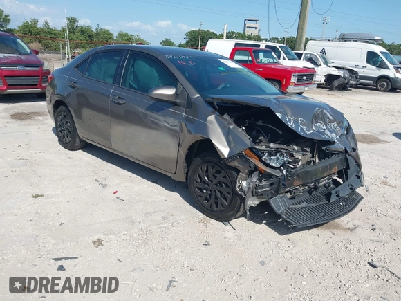 2019 Toyota Corolla L with VIN 5YFBURHE7KP878972, listed as a IAAI auction lot 42000888 with 201,612 mi miles. Bid and sale history available at carsss.com. Image 1.