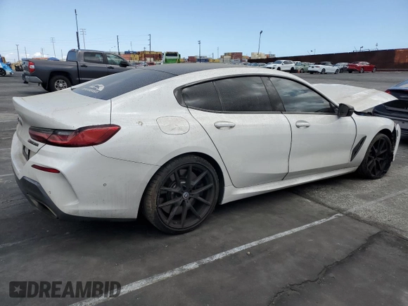 2021 BMW 8 Series M850i with VIN WBAGV8C04MCF56486, listed as a Copart auction lot 55991015 with 60,249 mi miles and Salvage title. Bid and sale history available at DreamBid. Image 3.