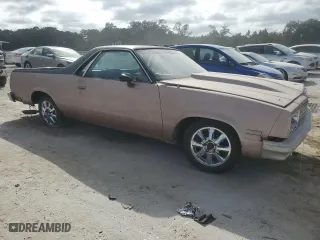1982 Chevrolet El Camino with VIN 1GCCW80HXCR198571, listed as a Copart auction lot 77004474 with 70,899 mi miles and Salvage Title. Bid and sale history available at carsss.com. Image 4.