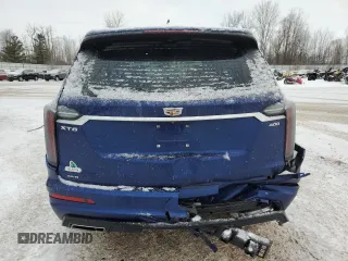 2024 Cadillac XT6 AWD Sport with VIN 1GYKPGRS4RZ734578, listed as a Copart auction lot 88603575 with 9,015 mi miles and Salvage Title. Bid and sale history available at carsss.com. Image 6.