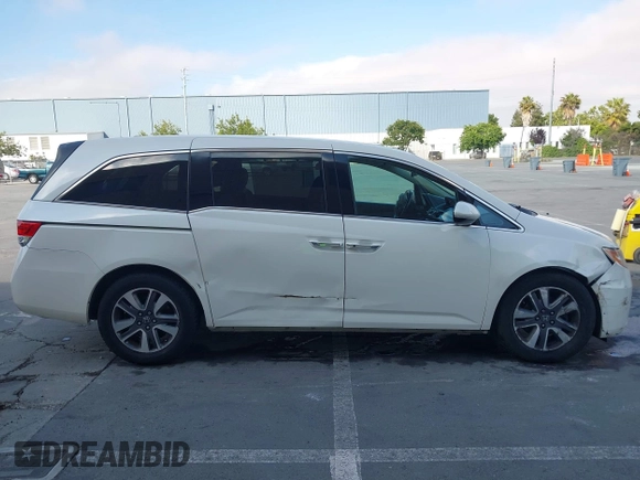 2015 Honda Odyssey Touring Elite with VIN 5FNRL5H9XFB102222, listed as a IAAI auction lot 42485059 with 123,562 mi miles and . Bid and sale history available at DreamBid. Image 13.