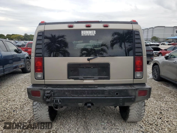 2006 Hummer H2 z VIN 5GRGN23U26H101561, wystawiony jako Copart lot #89308685 z przebiegiem 327 103 mil mil oraz Tytuł czysty. Historia ofert i sprzedaży dostępna na DreamBid. Obrazek 6.