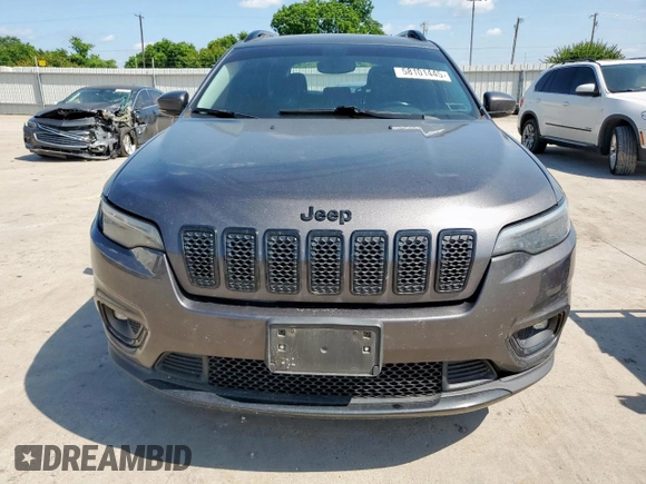2019 Jeep Cherokee Altitude with VIN 1C4PJLLB8KD448427, listed as a Copart auction lot 58101445 with 173,007 mi miles and Salvage title. Bid and sale history available at DreamBid. Image 5.