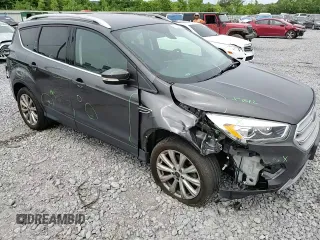2018 Ford Escape Titanium with VIN 1FMCU9J97JUB34691, listed as a Copart auction lot 56404625 with 107,037 mi miles and Salvage title. Bid and sale history available at DreamBid. Image 14.