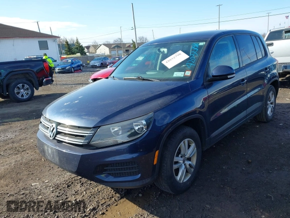 2014 Volkswagen Tiguan SE z VIN WVGAV3AX7EW541355, wystawiony jako IAAI lot #42032798 z przebiegiem 220 940 mil mil oraz . Historia ofert i sprzedaży dostępna na DreamBid. Obrazek 18.