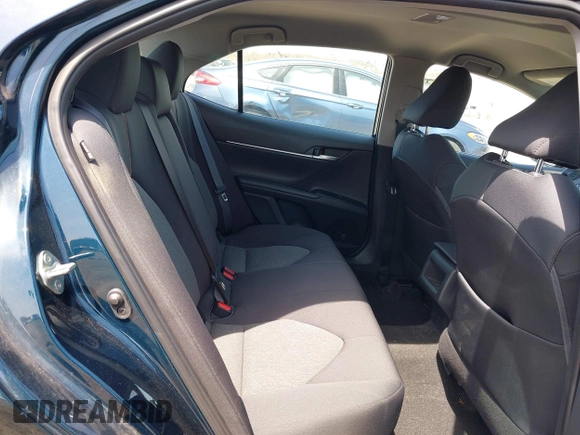 2019 Toyota Camry LE with VIN 4T1B11HK6KU276644, listed as a IAAI auction lot 42037249 with 23,677 mi miles and . Bid and sale history available at DreamBid. Image 8.