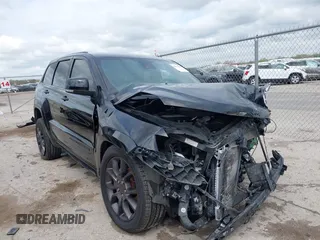 2020 Jeep Grand Cherokee Overland with VIN 1C4RJFCG8LC431009, listed as a IAAI auction lot 41915189 with 58,669 mi miles and . Bid and sale history available at DreamBid. Image 6.