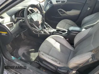 2013 Hyundai Veloster w/Gray Int z VIN KMHTC6AD1DU101406, wystawiony jako Copart lot #55087095 z przebiegiem 115 373 mil mil oraz Szkoda całkowita • Salvage title. Historia ofert i sprzedaży dostępna na DreamBid. Obrazek 7.