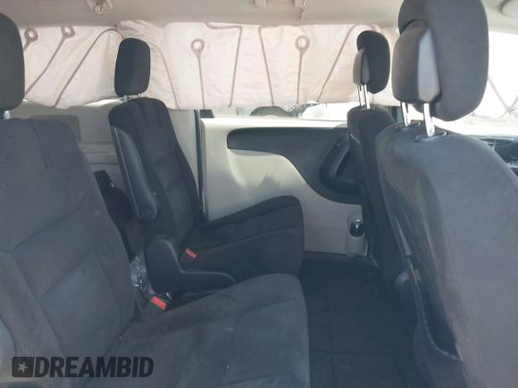 2014 Dodge Grand Caravan SXT with VIN 2C4RDGCG1ER429495, listed as a IAAI auction lot 42058513 with 136,936 mi miles and . Bid and sale history available at DreamBid. Image 8.