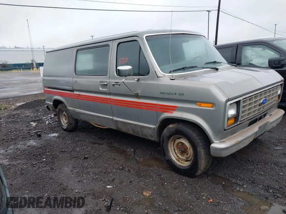 1990 Ford Econoline Cargo z VIN 1FTDE14Y4LHA18080, wystawiony jako IAAI lot #42324693 z przebiegiem Nie podano mil oraz . Historia ofert i sprzedaży dostępna na DreamBid. Obrazek 1.