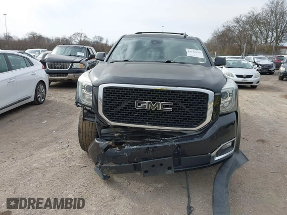 2016 GMC Yukon SLT with VIN 1GKS1BKC3GR272738, listed as a IAAI auction lot 41712439 with 169,726 mi miles. Bid and sale history available at carsss.com. Image 12.