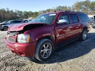 2007 Chevrolet Suburban LS with VIN 1GNFC16057J212547, listed as a Copart auction lot 48611455 with 257,188 mi miles and Salvage Title. Bid and sale history available at carsss.com. Image 1.