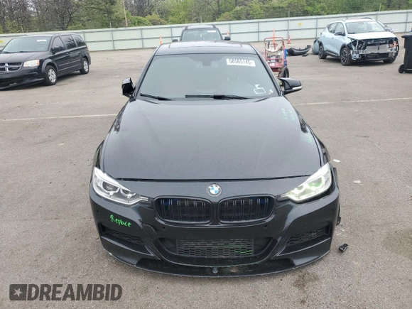 2014 BMW 3 Series 335i xDrive with VIN WBA3B9C55EF588272, listed as a Copart auction lot 58565145 with 88,085 mi miles and Salvage title. Bid and sale history available at DreamBid. Image 5.