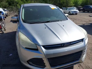 2014 Ford Escape SE with VIN 1FMCU0GX4EUD22334, listed as a IAAI auction lot 42007641 with 146,573 mi miles. Bid and sale history available at carsss.com. Image 6.