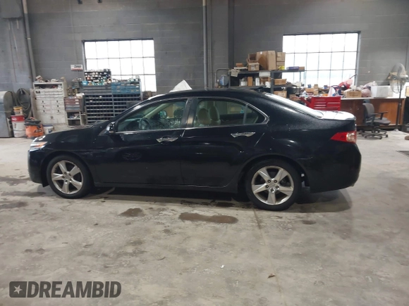 2012 Acura TSX with VIN JH4CU2F49CC010017, listed as a IAAI auction lot 42144097 with 217,581 mi miles and . Bid and sale history available at DreamBid. Image 14.