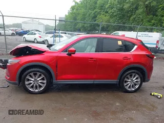 2019 Mazda CX-5 Grand Touring with VIN JM3KFBDM8K0693622, listed as a IAAI auction lot 42503818 with 60,812 mi miles and . Bid and sale history available at DreamBid. Image 13.