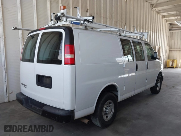 2015 Chevrolet Express Cargo with VIN 1GCWGFCF9F1277631, listed as a IAAI auction lot 42528992 with 243,209 mi miles and . Bid and sale history available at DreamBid. Image 4.