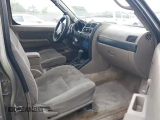 2003 Nissan Frontier XE z VIN 1N6ED29X93C444600, wystawiony jako IAAI lot #42097322 z przebiegiem 317 599 mil mil oraz . Historia ofert i sprzedaży dostępna na DreamBid. Obrazek 5.