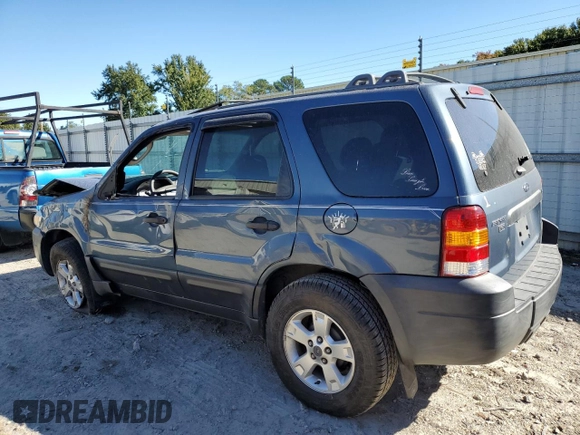 2006 Ford Escape XLT with VIN 1FMYU03106KA03632, listed as a Copart auction lot 75416404 with 151,559 mi miles and Salvage Title. Bid and sale history available at DreamBid. Image 2.