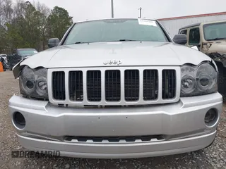 2005 Jeep Grand Cherokee Laredo z VIN 1J4GR48K05C506865, wystawiony jako IAAI lot #41539102 z przebiegiem 237 208 mil mil oraz . Historia ofert i sprzedaży dostępna na DreamBid. Obrazek 6.