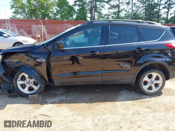 2013 Ford Escape SE with VIN 1FMCU0GX5DUD04780, listed as a IAAI auction lot 41990300 with 91,193 mi miles and . Bid and sale history available at DreamBid. Image 14.