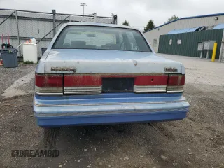 1991 Plymouth Acclaim z VIN 1P3XA4633MF523214, wystawiony jako Copart lot #55908665 z przebiegiem 90 332 mil mil oraz Tytuł czysty. Historia ofert i sprzedaży dostępna na DreamBid. Obrazek 6.