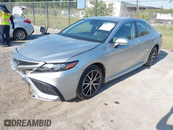 2023 Toyota Camry SE with VIN 4T1G11AK5PU750719, listed as a IAAI auction lot 42133210 with 55,688 mi miles. Bid and sale history available at carsss.com. Image 2.