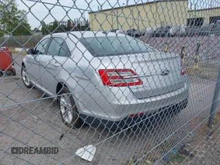 2013 Ford Taurus SEL with VIN 1FAHP2H87DG191746, listed as a IAAI auction lot 40445448 with 231,634 mi miles and . Bid and sale history available at DreamBid. Image 3.