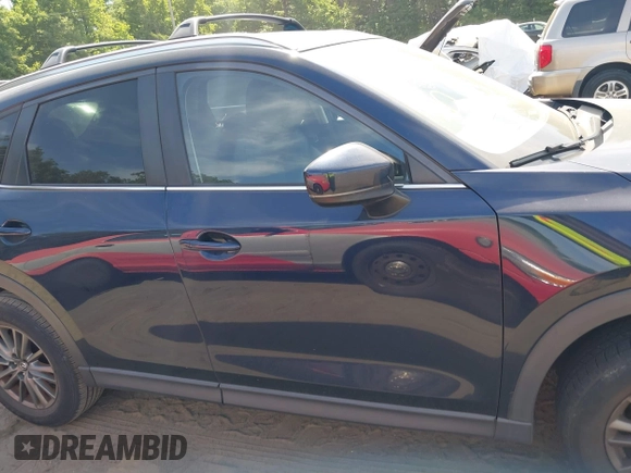 2017 Mazda CX-5 Touring z VIN JM3KFBCL5H0133493, wystawiony jako IAAI lot #39666644 z przebiegiem 125 048 mil mil oraz . Historia ofert i sprzedaży dostępna na DreamBid. Obrazek 14.
