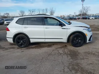 2023 Volkswagen Tiguan SE R-Line Black with VIN 3VV8B7AX9PM086225, listed as a IAAI auction lot 41276879 with Not provided miles and . Bid and sale history available at DreamBid. Image 13.