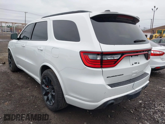 2023 Dodge Durango SRT 392 Premium with VIN 1C4SDJGJ8PC715232, listed as a IAAI auction lot 42051499 with 10,998 mi miles and . Bid and sale history available at DreamBid. Image 3.
