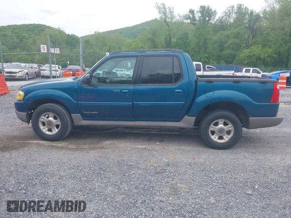 2001 Ford Explorer Sport Trac z VIN 1FMZU77E11UC71161, wystawiony jako IAAI lot #42184342 z przebiegiem 196 240 mil mil oraz . Historia ofert i sprzedaży dostępna na DreamBid. Obrazek 14.