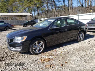 2015 Volvo S60 T5 Drive-E Platinum with VIN YV140MFM9F2336529, listed as a Copart auction lot 87943575 with 73,280 mi miles and Salvage Title. Bid and sale history available at carsss.com. Image 1.