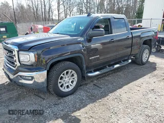2018 GMC Sierra 1500 SLE z VIN 1GTV2MEC3JZ143967, wystawiony jako IAAI lot #41853850 z przebiegiem 80 205 mil mil oraz . Historia ofert i sprzedaży dostępna na DreamBid. Obrazek 17.