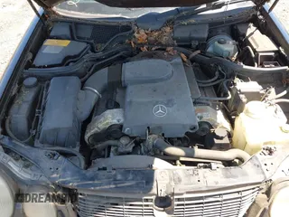 1997 Mercedes-Benz E-Class with VIN WDBJF72F8VA309745, listed as a IAAI auction lot 42119469 with 131,318 mi miles. Bid and sale history available at carsss.com. Image 10.