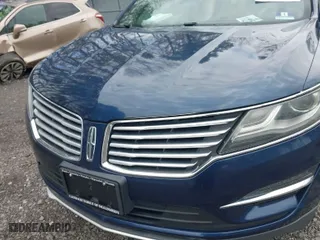 2015 Lincoln MKC with VIN 5LMTJ2AH4FUJ17746, listed as a IAAI auction lot 42027746 with 111,240 mi miles. Bid and sale history available at carsss.com. Image 6.