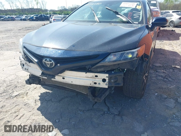 2021 Toyota Camry SE Nightshade with VIN 4T1G11AK5MU404780, listed as a IAAI auction lot 41897739 with 94,320 mi miles and . Bid and sale history available at carsss.com. Image 6.