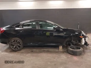 2019 Honda Civic Sport with VIN 2HGFC2F84KH590469, listed as a IAAI auction lot 41686757 with 79,602 mi miles and . Bid and sale history available at DreamBid. Image 14.