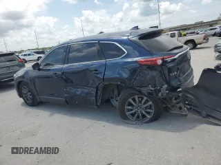 2020 Mazda CX-9 Touring with VIN JM3TCACY1L0423340, listed as a Copart auction lot 57389305 with 64,737 mi miles and Salvage title. Bid and sale history available at DreamBid. Image 2.